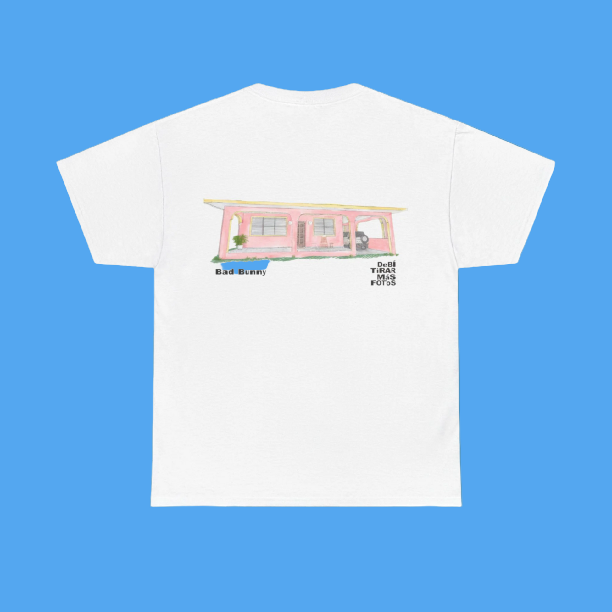 White t-shirt with a graphic of a pink building on a blue background
